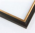 This 1-1/4 " frame features a black finish with a gold accent lip. This frame is the perfect mix of modern and timeless to add elegance to any artwork.