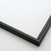 This simple metal picture frame has a bold, high-shine black finish and curved profile. The outer drop edge has a tiny vertical ridge texture. 

.375 " width: ideal for small or medium artworks. Easily frame photographs, paintings or drawings on paper, or even Giclée canvas prints.