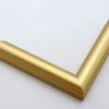 This simple metal picture frame in frosted gold has a smooth finish and curved profile. 

.875 " width: ideal for small, medium or large artworks. Easily frame photographs, thicker cloth or needlework art, or even Giclée canvas prints.