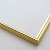 This simple metal picture frame has a gold, high-shine finish, brush-textured drop edge and a curved profile.

.375 " width: ideal for small and medium artworks. Easily frame photographs, thicker cloth or needlework art, or even Giclée canvas prints.