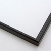 This simple metal picture frame has a smooth, frosted black finish, brush-textured drop edge and a curved profile.

.375 " width: ideal for small and medium artworks. Easily frame photographs, thicker cloth or needlework art, or even Giclée canvas prints.
