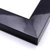 This dense, deep frame in high shine solid black features a .75 " inner edge, creating a strong shadow and sense of depth around the artwork.

2 " width: ideal for medium and large images.  Select a strong piece of art for this frame, to keep the border from overpowering the image.