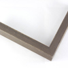 This simple, flat faced frame features rustic wood with a light wash. The natural grain shows through the thin, mid-brown varnish, giving the frame a soft, antiqued appearance.

3/4 " wide: ideal for small and medium-size images.  Whether photography or paintings, rural scenes and simple images will look striking in this frame.