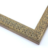This slim, ornamented design features bevelled inner and outer edges and a celtic cross pattern in relief  The solid wood frame is covered in a gold foil with a faint brown patina that gives it an antiqued look.

1.25 " width: ideal for smaller artwork.  Photographs, paintings and giclee prints will shine within this detailed frame.