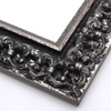 This ornate, intricate frame features a bold relief design in a black-mottled antique silver foil. The raised, roughly textured inner lip is silver foil as well.

2.75 " width: ideal for large images.  Select a strong piece of artwork to avoid it being overpowered by this decadent frame.
