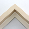 This large, L-shaped floating contemporary canvas frame in natural tone features a wide flat face.
*Note: These solid wood, custom canvas floaters are for stretched canvas prints and paintings, and raised wood panels.