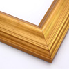 This high swan profile wood frame features a reverse slope and 1.5 " maximum depth.  The gentle ridges are encased in glossy gold foil, and gentle distressing reveals a burnished, deep red undercoat.  It is an elegant but simple design.

2.5 " width: ideal for medium and large images.  Pair with old, grayscale portraits and bold paintings or Giclée prints.