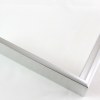 Slim 5/16 " metal frame. This frame comes in metallic aluminum silver. The face has a smooth, mirror texture and reflects sharp light. The profile features a horizontal brushed texture.

Nielsen n22-01 Profile
