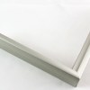 Slim 5/16 " metal frame. This frame comes in metallic grey-silver with subtle green undertones. The face has a frosted texture and reflects dispersed light. The profile features a horizontal brushed texture.

Nielsen n22-14 Profile