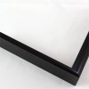 Slim 5/16 " metal frame. This frame comes in solid mars black. The face has a smooth, mirror texture and reflects sharp light. The profile features a horizontal brushed texture.

Nielsen n22-20 Profile
Anodic/Semi-Gloss  Black
