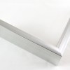 This 7/16 " traditional metal frame is a perfect fusion of timeless design and contemporary flair. With a slim face and deep profile, this frame provides a sleek and elegant presentation for your treasured artwork or photographs. The white silver finish imparts a touch of sophistication, elevating any displayed content to new heights.

Adding a touch of artistic charm, the frame features a horizontal brushed texture that adds subtle visual interest and depth. The texture enhances the overall appeal, creating a captivating interplay of light and shadows.

Designed to disperse light gracefully, this frame ensures that your displayed content is showcased brilliantly, while avoiding distracting glares. Embrace the beauty of simplicity and elegance with this exquisite metal frame, a perfect addition to any space that demands both style and refinement.

Nielsen n35-01 Profile