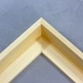 This L-shaped canvas floater frame features a natural finish, with a 1-5/8 " depth for artworks.
*Note: These solid wood, custom canvas floaters are for stretched canvas prints and paintings, and raised wood panels.