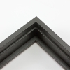 This tall, deep stair step floating canvas frame in matte black features a shallow recessed stair below the outer face and a natural wood grain texture. The canvas will hover neatly, resting on the lowest, flat edge.
Give an authentic, fine art display to your favourite canvas Giclée print or acrylic painting. This canvas floating frame is ideal for medium, large or extra large canvases on thick (1.5 " deep) stretcher bars.
*Note: These solid wood, custom canvas floaters are for stretched canvas prints and paintings, and raised wood panels.