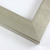 This simple, high-sheen frame features a smooth face of gold-brushed, silver foil finish. Hints of the natural wood grain show through for a delicate, modern take on a basic style.

1.75 " width: ideal for medium and large images.  Border a bold greyscale photograph or acrylic painting or Giclée print in this subtle, contemporary frame.