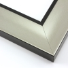 This simple, bold frame features scoop profile and silver foil face.  The inner lip is stepped down and painted a matte black, to match the outer drop edge.

2.75 " width: ideal for large and extra large artworks. Due to it