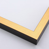 This simple gold foil frame features an eye catching shine on the slim, flat face, and a deep black perpendicular edge. Dress it up with an old watecolour or oil painting, or make it modern with a bright family photograph. 

.75 "es wide: ideal for small- to medium-size images.